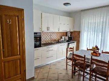 Four-Bedroom Apartment for 8 Guests in Soline