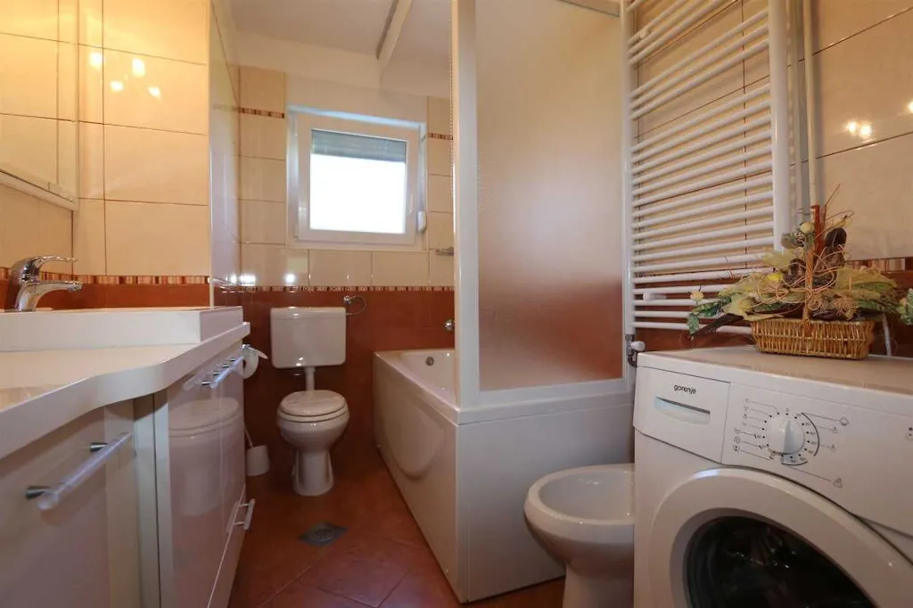 Family Apartment in Šilo with Private Balcony
