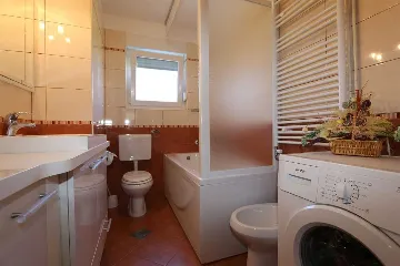 Family Apartment in Šilo with Private Balcony