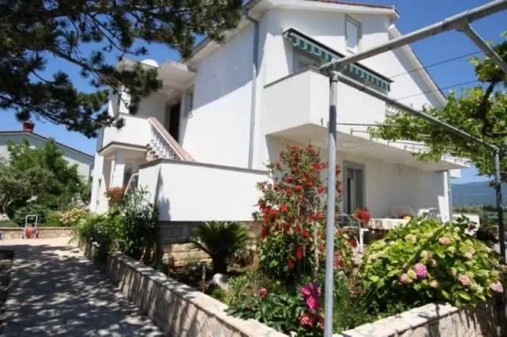Family Apartment in Šilo with Private Balcony