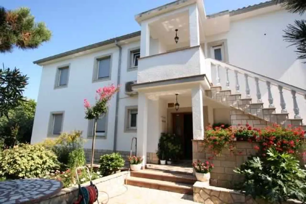 Family Apartment in Šilo with Private Balcony
