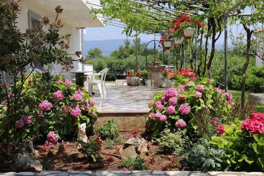 Family Apartment in Šilo with Private Balcony