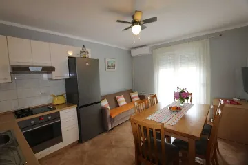 Family Apartment in Šilo with Private Balcony