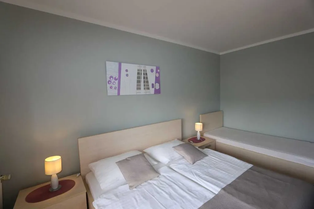Family Apartment in Šilo with Private Balcony