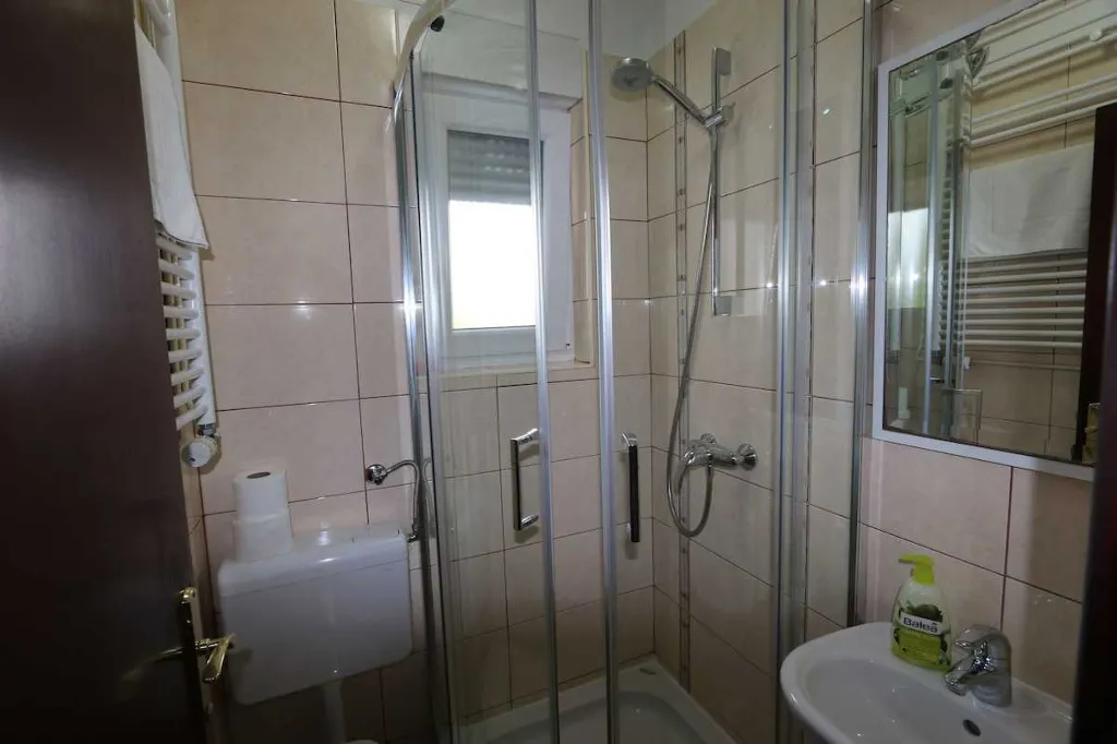 Family Apartment in Šilo with Private Balcony