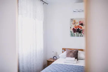 Split 3-Bedroom Apartment with Private Garden