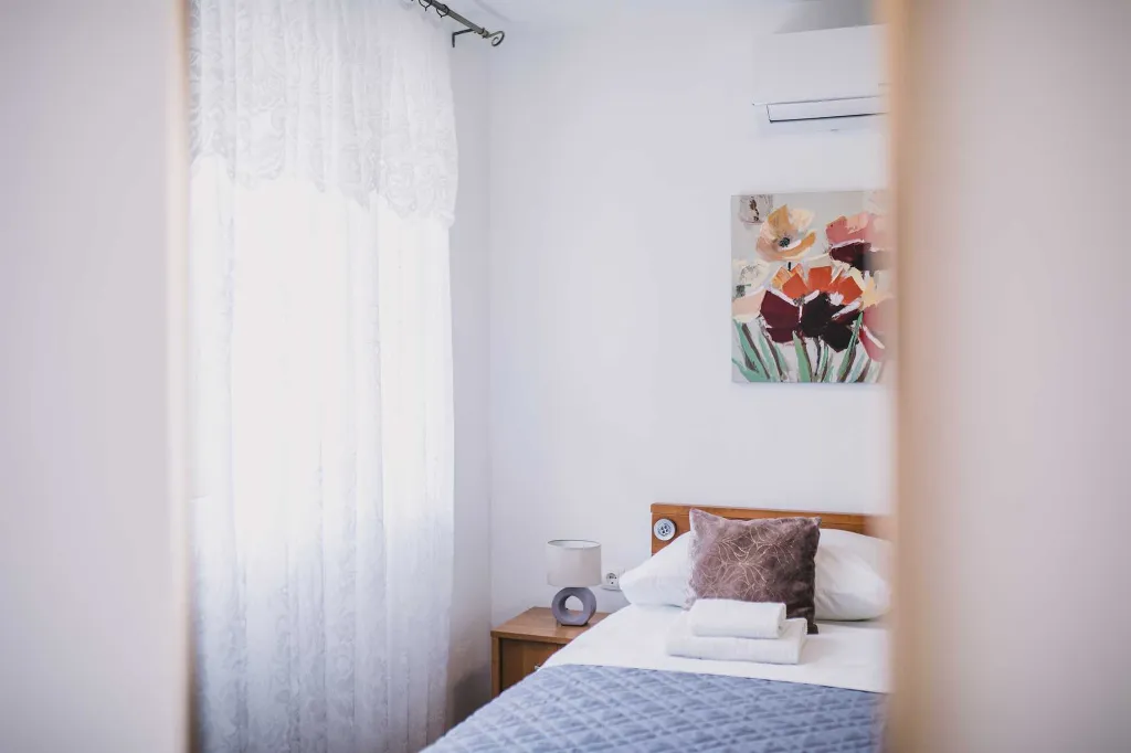 Split 3-Bedroom Apartment with Private Garden