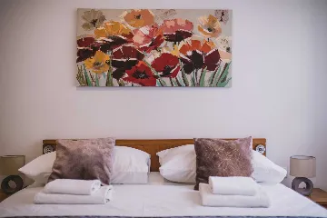 Split 3-Bedroom Apartment with Private Garden