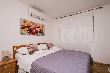 Split 3-Bedroom Apartment with Private Garden
