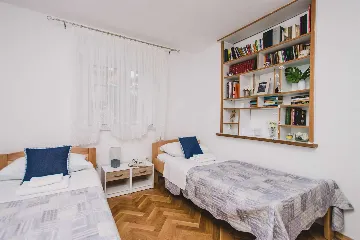 Split 3-Bedroom Apartment with Private Garden