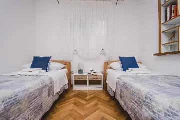 Split 3-Bedroom Apartment with Private Garden