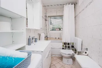 Split 3-Bedroom Apartment with Private Garden