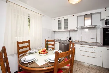 Split 3-Bedroom Apartment with Private Garden