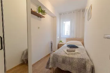 Split 3-Bedroom Apartment with Private Garden