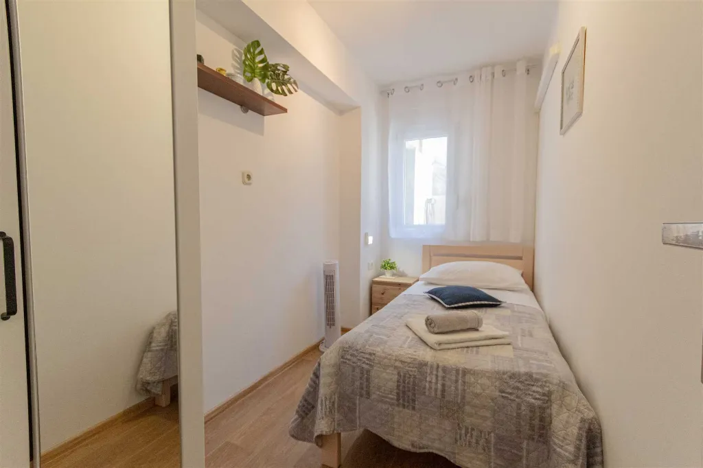 Split 3-Bedroom Apartment with Private Garden