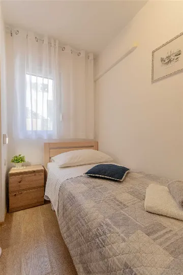 Split 3-Bedroom Apartment with Private Garden