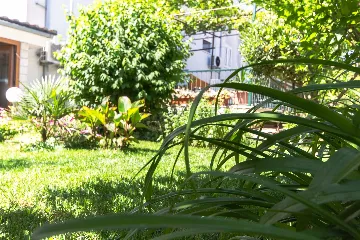 Split 3-Bedroom Apartment with Private Garden