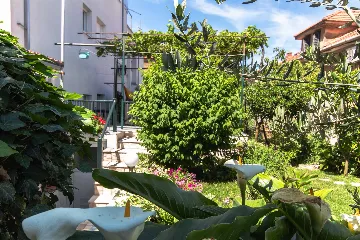 Split 3-Bedroom Apartment with Private Garden