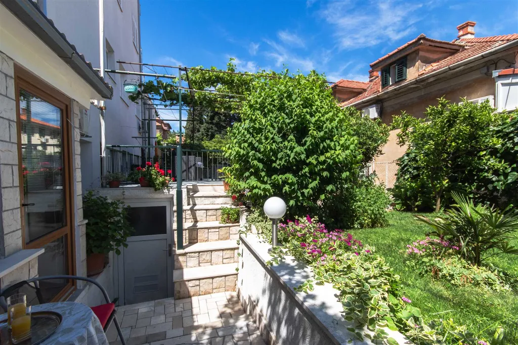Split 3-Bedroom Apartment with Private Garden