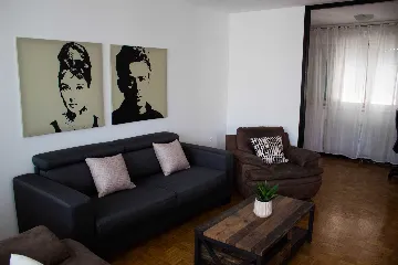 Split 3-Bedroom Apartment with City-View Balcony