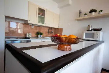 Split 3-Bedroom Apartment with City-View Balcony