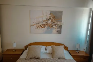 Split 3-Bedroom Apartment with City-View Balcony