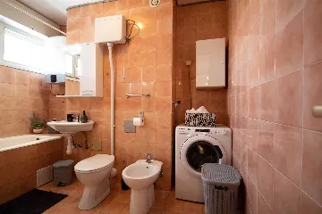 Split 3-Bedroom Apartment with City-View Balcony