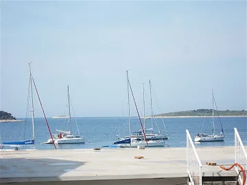 Two-Bedroom Apartment with Parking in Primošten