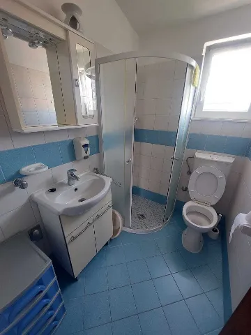 Rogoznica Two-Bedroom Apartment for 4 Guests