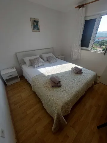 Rogoznica Two-Bedroom Apartment for 4 Guests