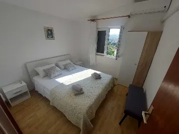 Rogoznica Two-Bedroom Apartment for 4 Guests