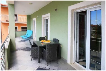 Two-Bedroom Apartment in Primošten for 5 Guests