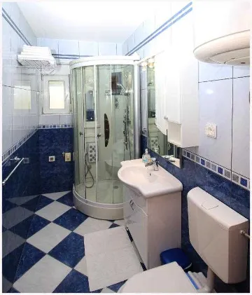 Two-Bedroom Apartment in Primošten for 5 Guests