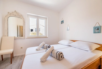 Two-Bedroom Apartment in Baška for 4 Guests