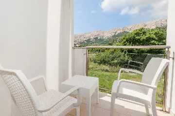 Two-Level 3-Bedroom Apartment in Baška for 8