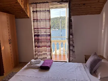 Apartment for 2 Guests with Sea View in Polače