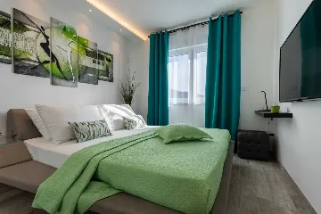 Two-Bedroom Apartment in Baška for 4 Guests