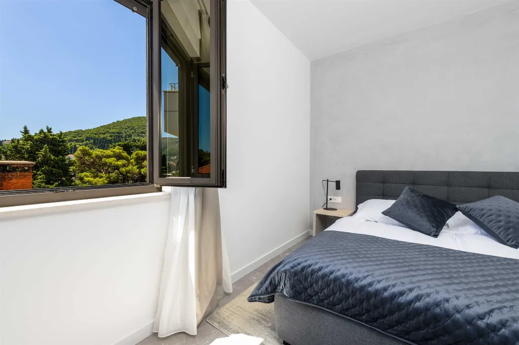 Two-Bedroom Apartment with Terrace & Partial Sea View