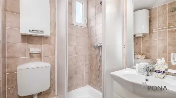 Renovated 2-Bedroom Apartment in Kolan, Croatia