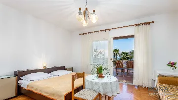 Apartment in Ičići for 4 Guests with Sea View