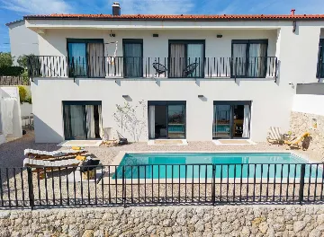 Villa for 7 Guests in Vrbnik with Pool and Sea View