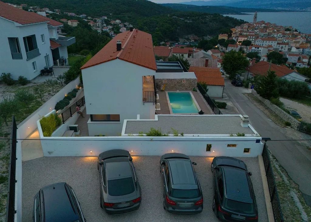 Villa for 7 Guests in Vrbnik with Pool and Sea View