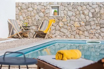 Villa for 7 Guests in Vrbnik with Pool and Sea View