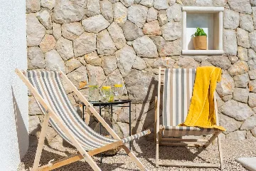 Villa for 7 Guests in Vrbnik with Pool and Sea View