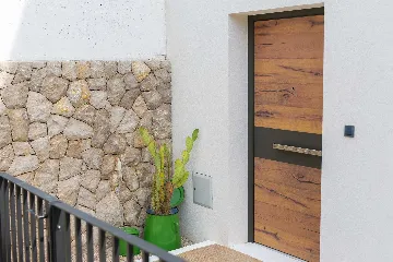 Villa for 7 Guests in Vrbnik with Pool and Sea View