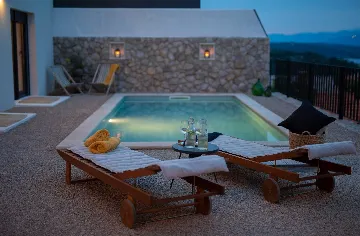 Villa for 7 Guests in Vrbnik with Pool and Sea View