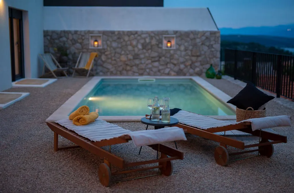 Villa for 7 Guests in Vrbnik with Pool and Sea View