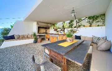 Villa for 7 Guests in Vrbnik with Pool and Sea View