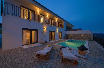 Villa for 7 Guests in Vrbnik with Pool and Sea View