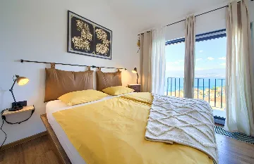 Villa for 7 Guests in Vrbnik with Pool and Sea View